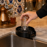Rince-verres utilisé dans un café